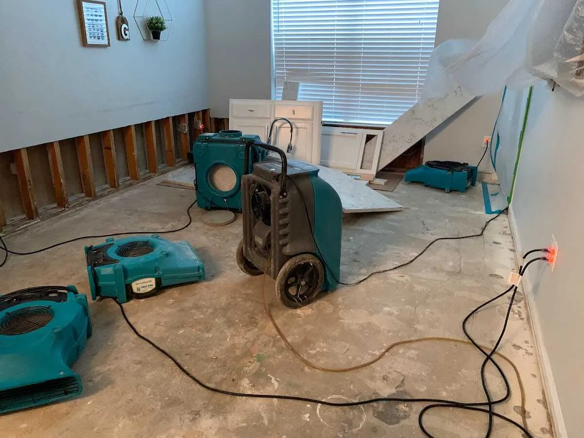 Dehumidifier in flood-cut room for Water Damage Restoration in St. Cloud
